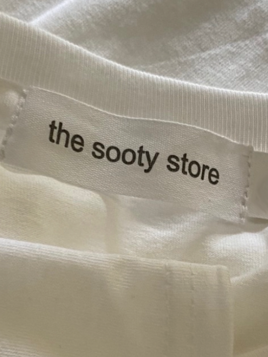 Close up showing the sooty store label