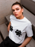 The sooty store white t shirt with black nipple logo shapes